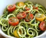 Raw Spiralized Zucchini Noodles with Tomatoes and Pesto