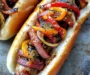 Grilled Turkey Bacon-Wrapped Beer Brats with Drunken Peppers and Onions