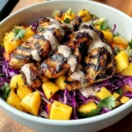 Jerk Chicken & Mango Slaw Bowls with Honey Lime Cream
