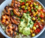 Grilled Shrimp Bowl with Avocado, Corn Salsa & Creamy Sauce Awaits You!