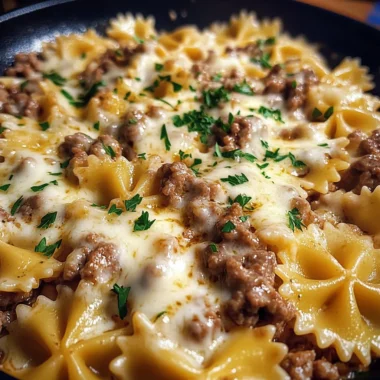 CHEESY GARLIC PARMESAN BEEF BOWTIE PASTA SKILLET