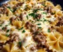 CHEESY GARLIC PARMESAN BEEF BOWTIE PASTA SKILLET