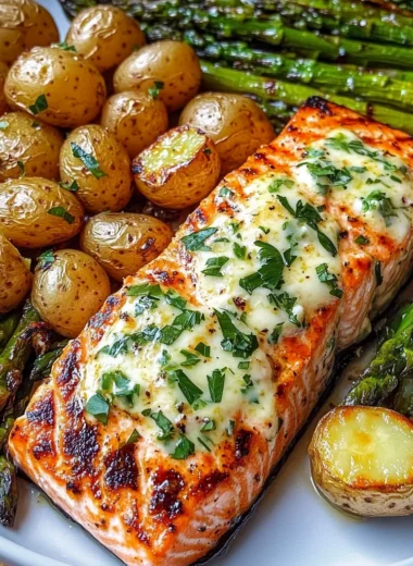 Grilled Salmon with Garlic Butter Baby Potatoes & Cheesy Asparagus