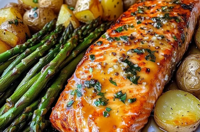 Honey Garlic Glazed Salmon with Roasted Potatoes & Cheesy Asparagus