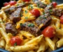 One Skillet Spicy Cajun Cheddar Steak Pasta